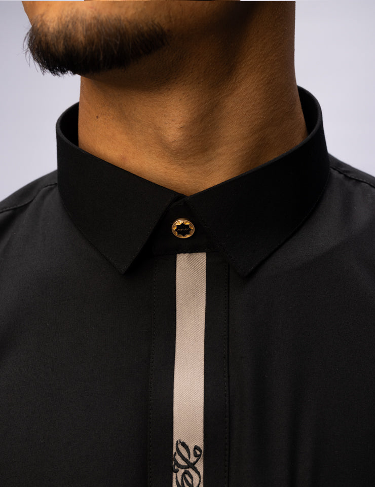 Black Ace Thobe by Amaani with signature buttons at collar, pocket and cuffs, men's thobe SA