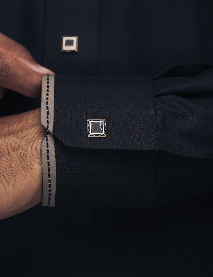 Black Elegance thobe by Amaani, refined collar patterning and button detail