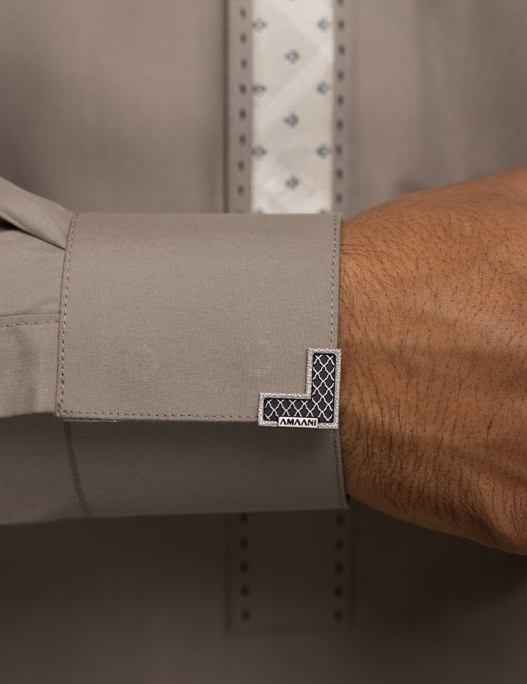 Beige Amaani Onyx Thobe cuff detail with Amaani Signature Button