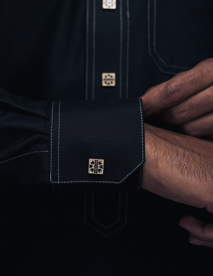 Amaani Royal Thobe in classic black, cuff detail with signature button and unique stitching