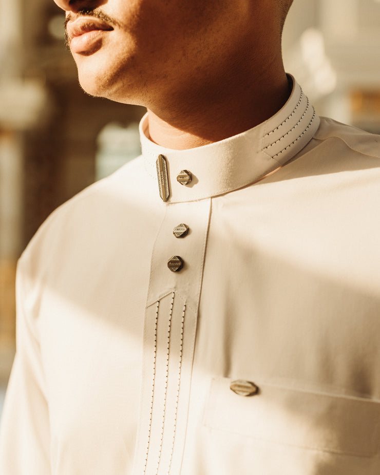 White Amaani Hubb Thobe, fifth styled view - premium thobe with signature buttons, South Africa