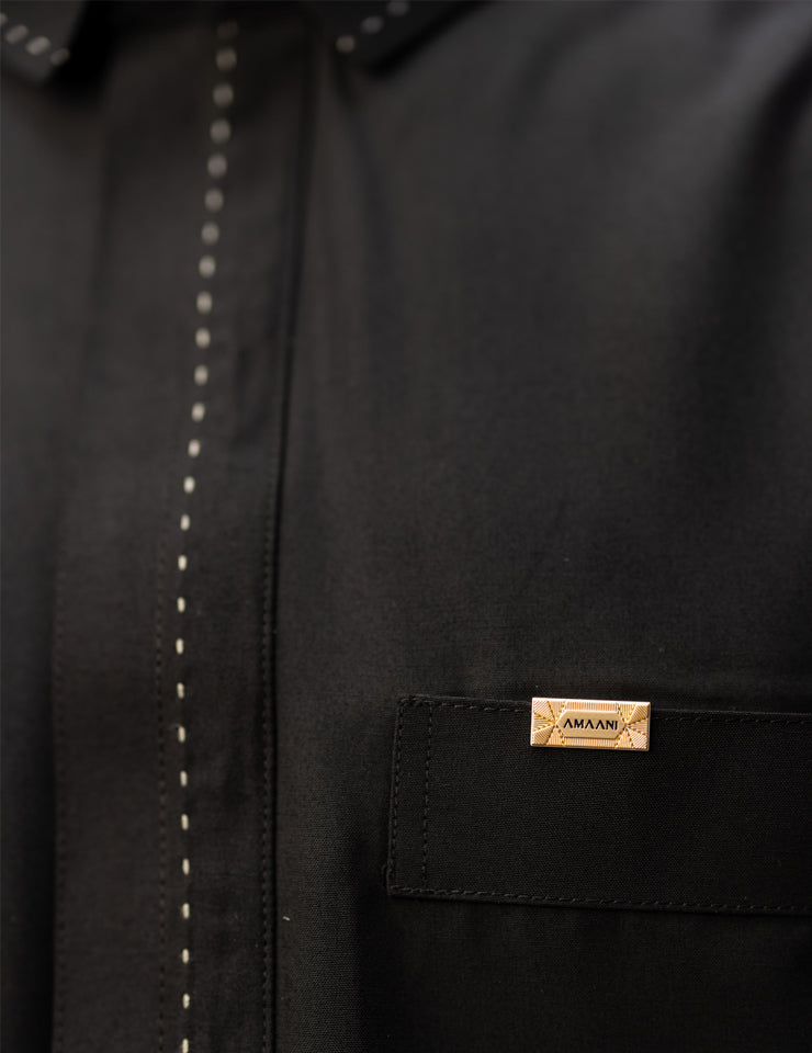 Iconic Thobe by Amaani in black, refined cuff stitching and tailored fit, South Africa
