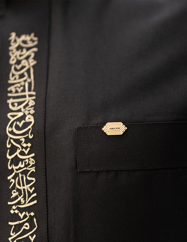 Amaani Noir Thobe in black with architectural cuff detailing, luxury men's thobe South Africa