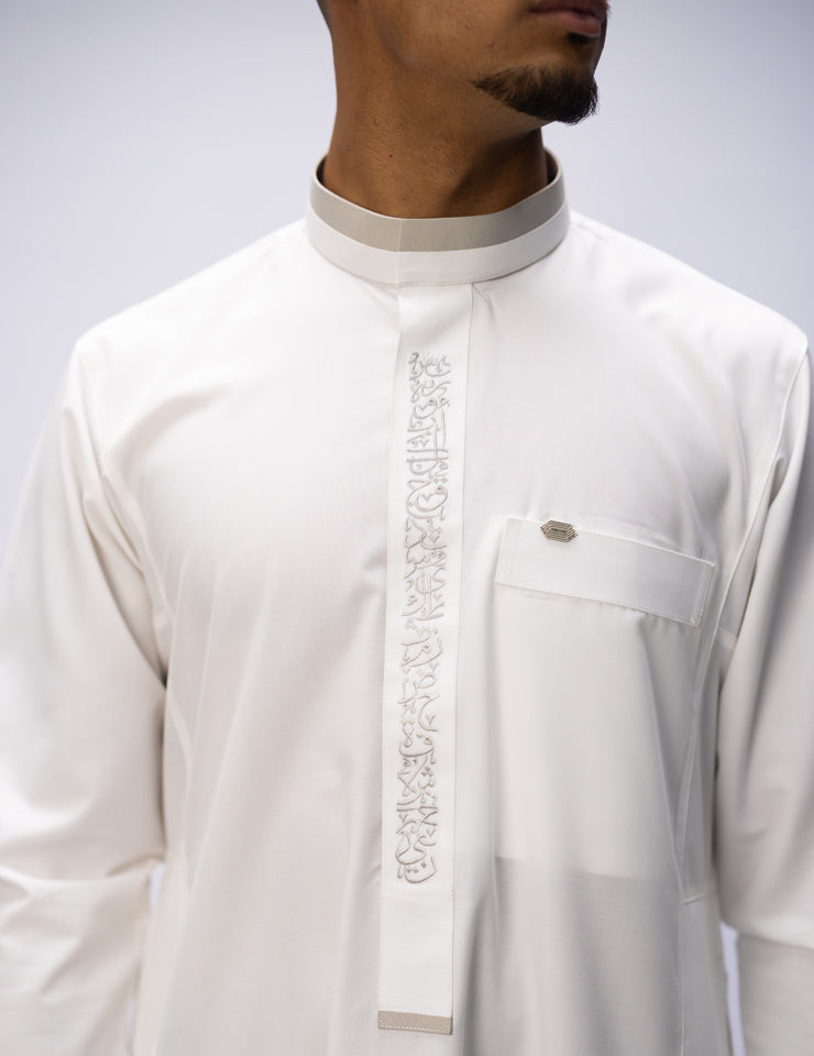 White Noir Thobe by Amaani with signature buttons at top pocket and cuff, South Africa