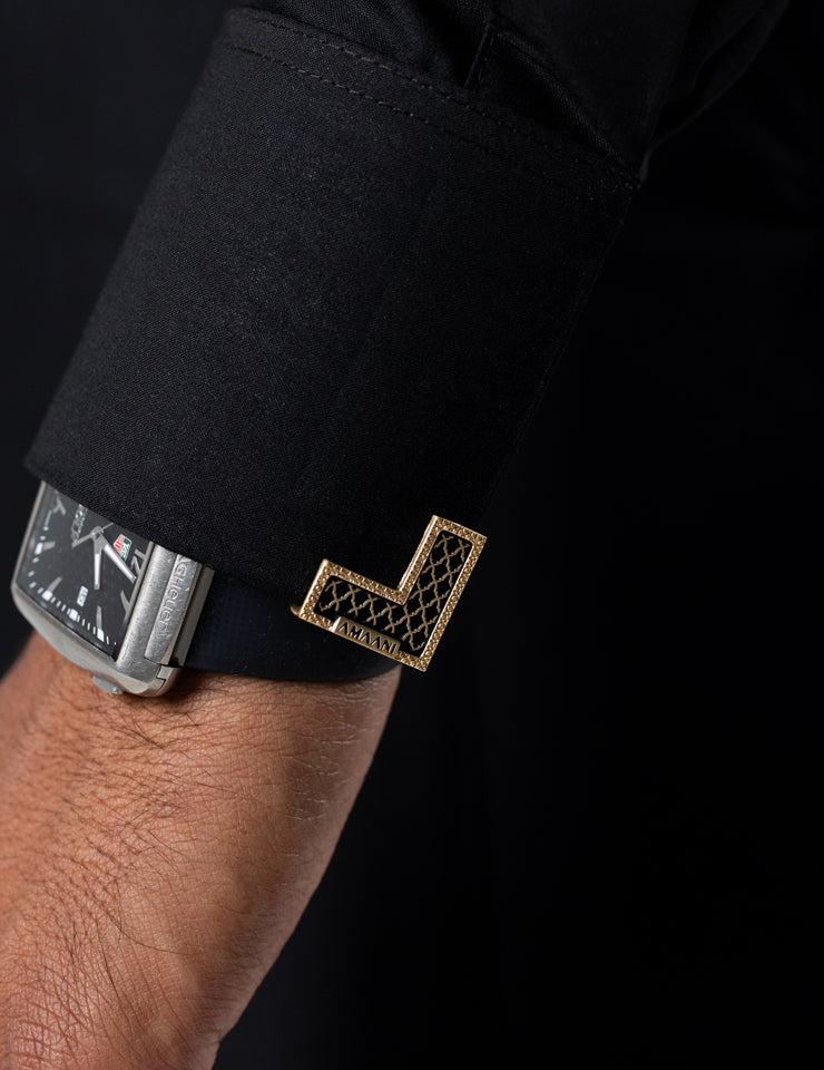 Cuff detail with signature Amaani buttons on the black Sakeen Saudi Thobe