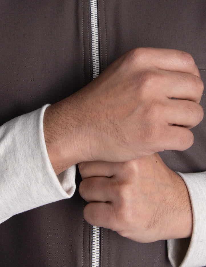 Urban Thobe in Grey with Beige, detail of zipper placket and jersey stretch cuffs
